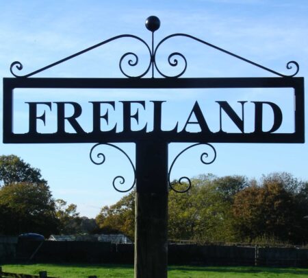 Hot Forged Metal Name Sign Atop Post