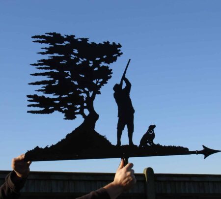 Man Shooting High Bird With Dog And Windswept Tree Weathervane