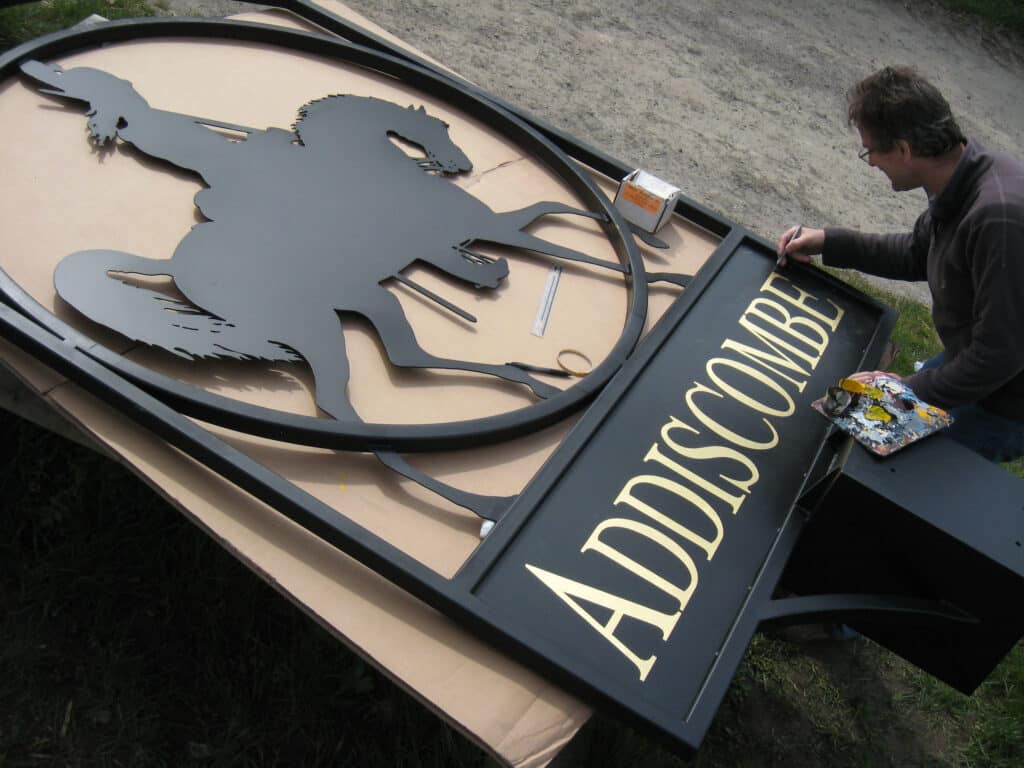 Addiscombe town sign being 23Ct. gold leafed