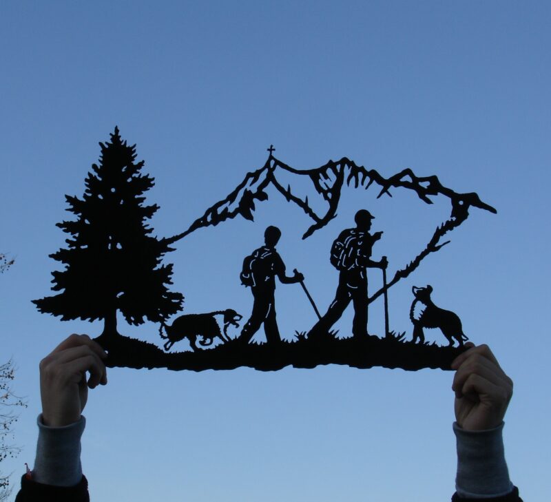 Hikers and Collies In The Mountains Wall Art Plaque