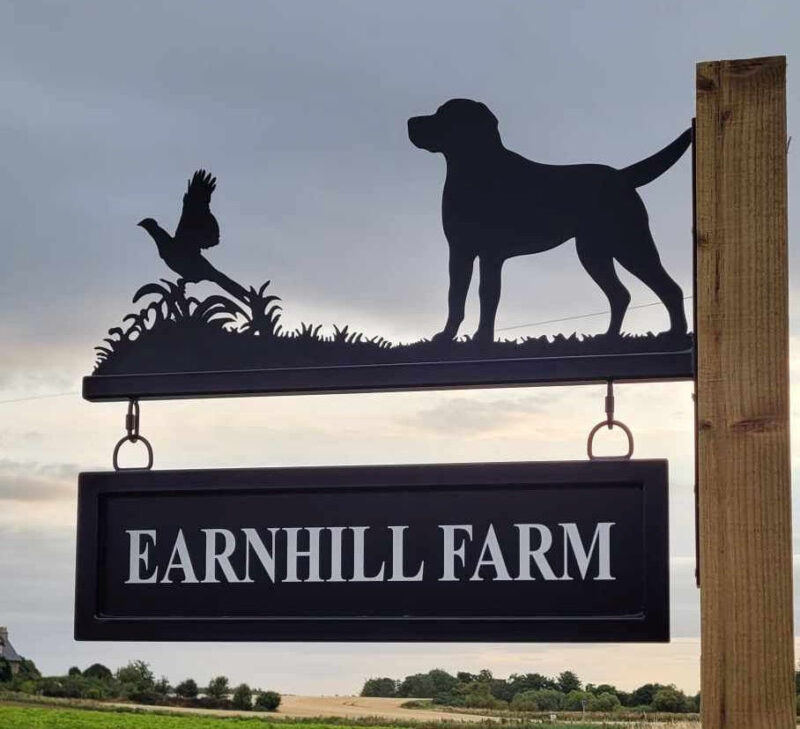 Lab and Pheasant hanging bracket sign installed