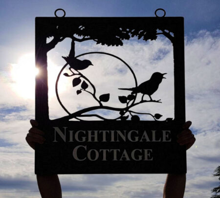 Nightingales with moon framed picture sign