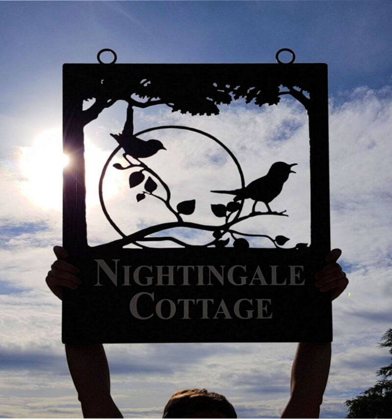 Nightingales with moon framed picture sign