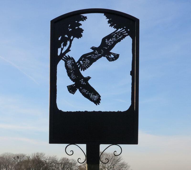 Pair Of Flying Buzzards Framed Sign with arched top and post-top sleeve