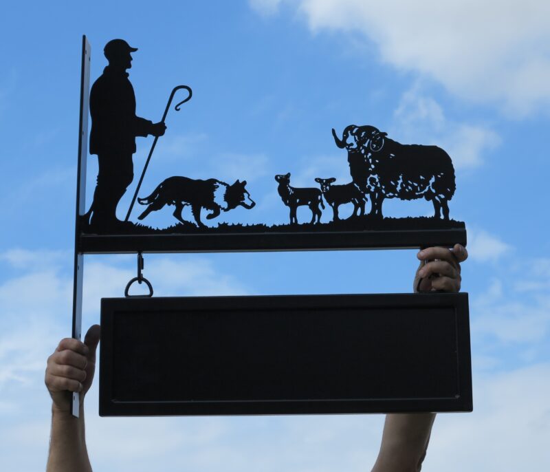Shepherd, collie, ram tup and lambs hanging bracket sign