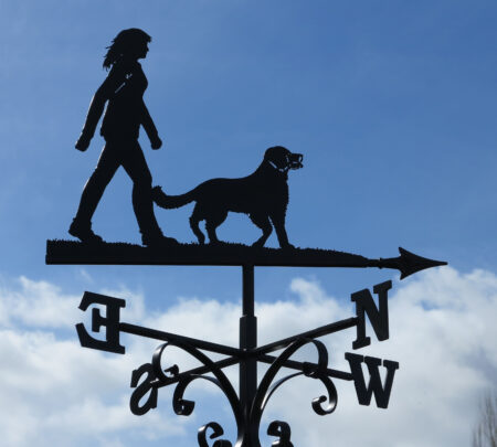 Woman Walking With Retriever Dog Weathervane