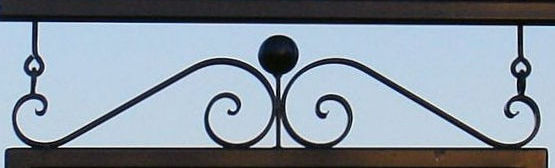 Scrolls Atop Frame Hanging Sign