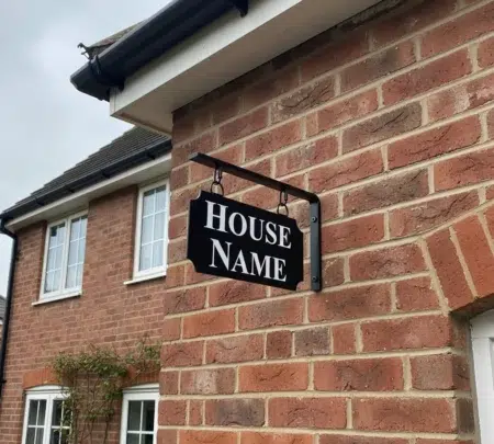 Small Hanging Metal House Name Sign - Fitted To Brick Wall - Scallop Corners